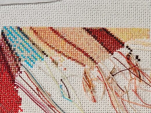 Red Feather Friend progress by @stitch.sans.frog: a calm stitch with bright cardinal colour