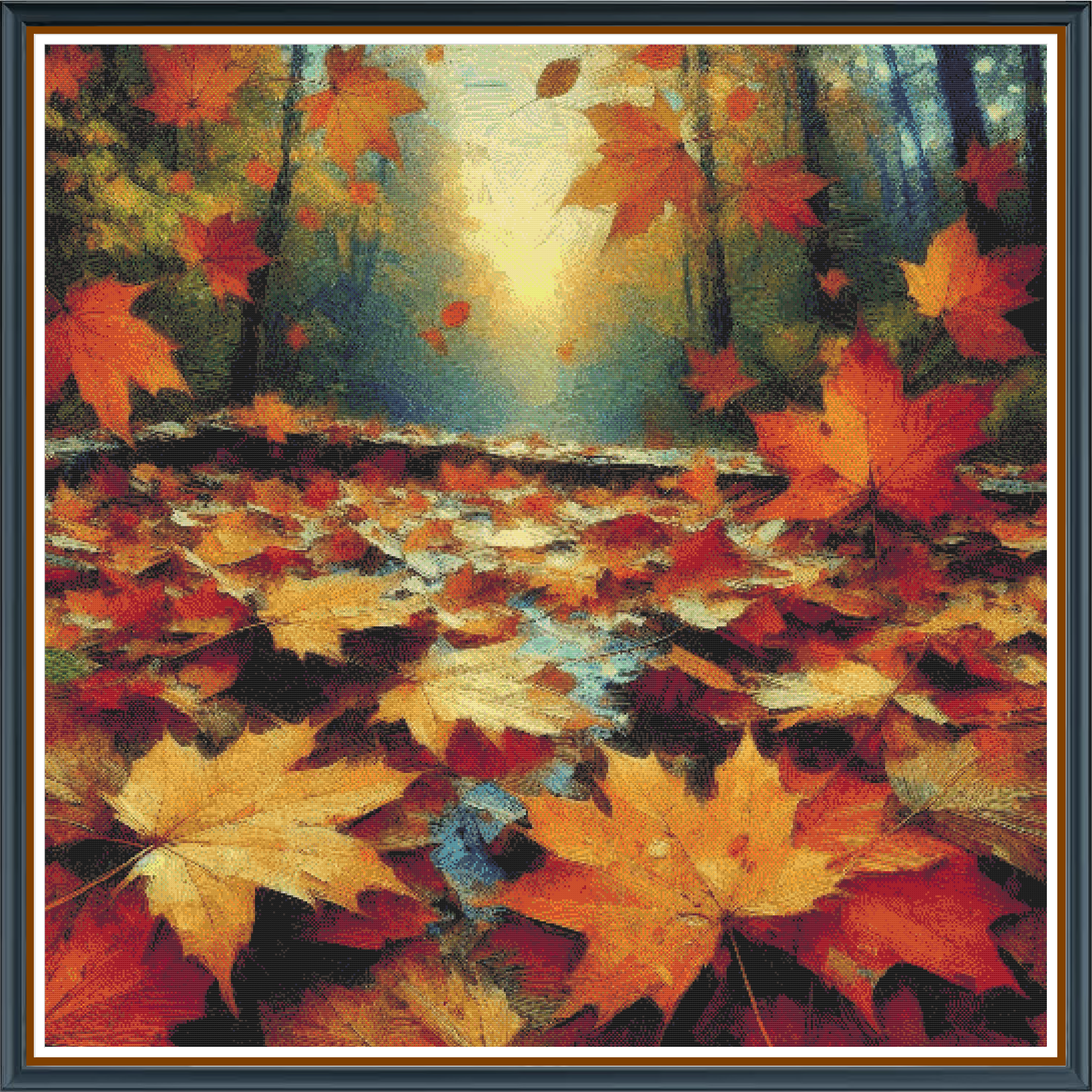 Autumn Leaves digital cross stitch pattern. A forest filled with falling and fallen maple leaves in vibrant reds, oranges, and yellows, with many leaves floating on a pond surrounded by the trees they fell from.